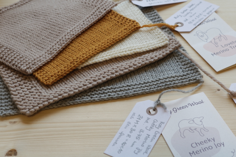 Gauge swatches in different colours with little hangtags on them